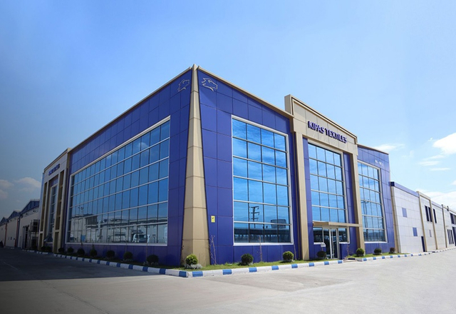 SUNTECH & KIPASKIPAS MENSUCAT ISLETMLERİ A.S. Automated Material Handling Solution Reduce Labor & Boost Efficiency
